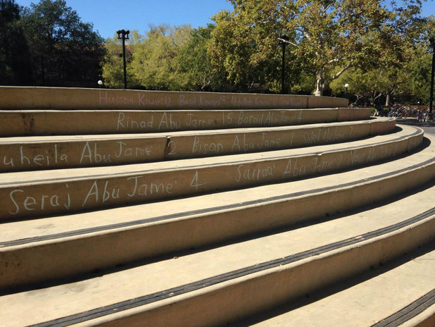 Activists at Stanford University wrote the names of Palestinian children killed in Gaza on campus steps.