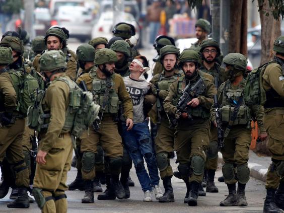 Sixteen-year-old Fawzi al-Junaidi on 7 December during protests in the West Bank city of Hebron over US President Donald Trump’s decision to recognise the contested city of Jerusalem as the capital of Israel.